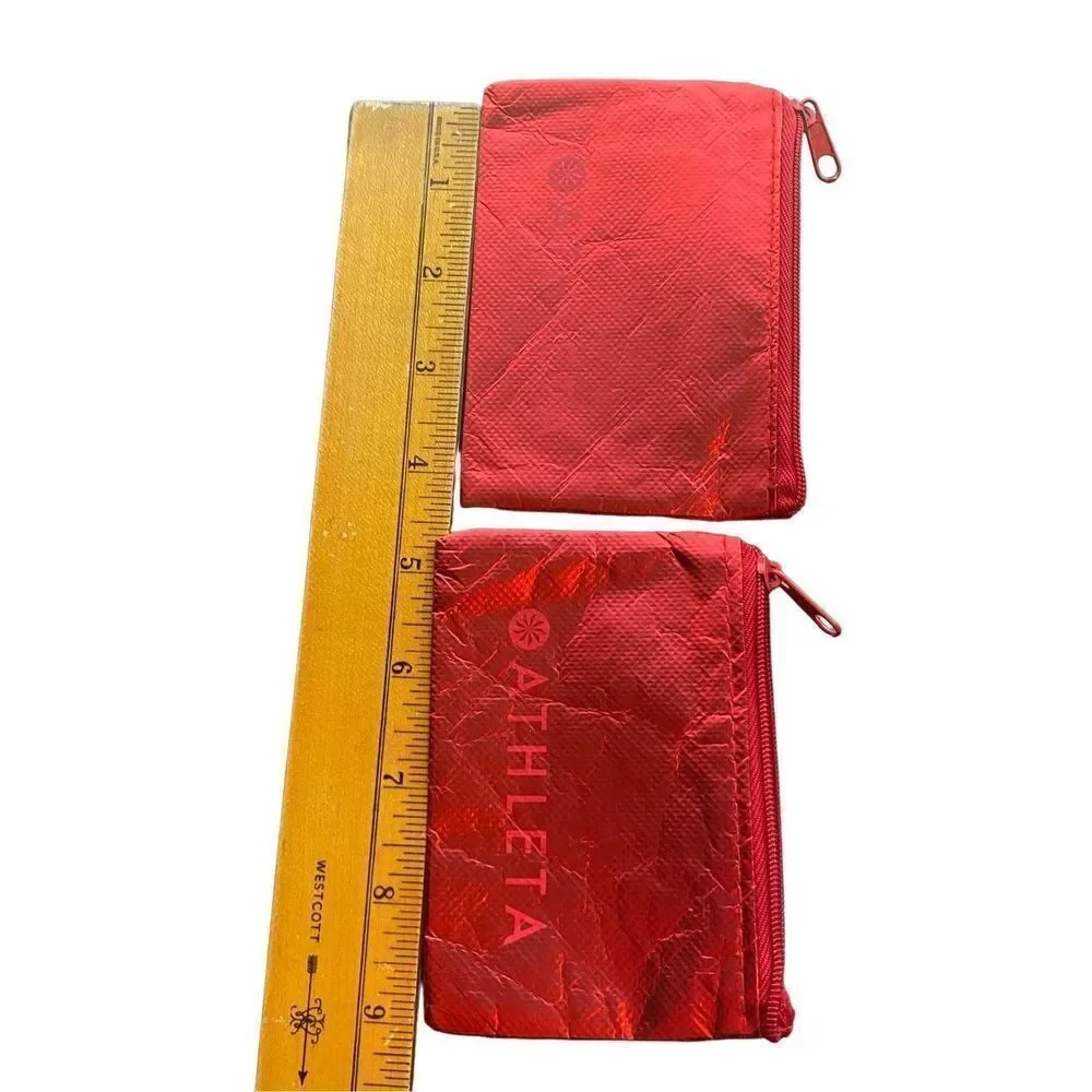 Athleta red zippered travel makeup ear pod gift card bags set of two